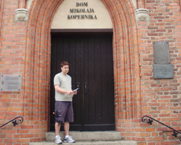 Sean in front of the birthplace of Nicolaus Copernicus, Torun, Poland, 19 February 1473